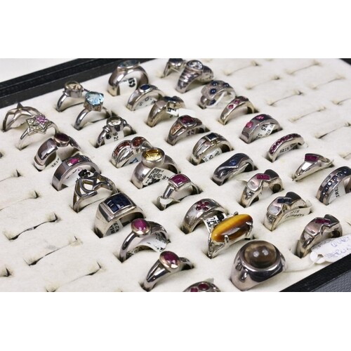 A collection of 35 silver rings (35), set with various gemst...
