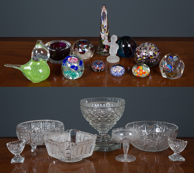 A collection of glassware and paperweights