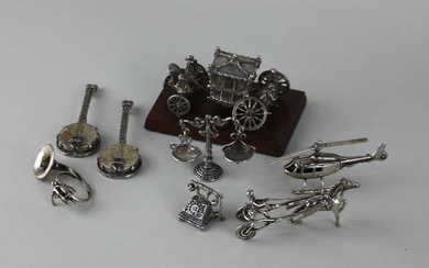 A collection of miniature silver models