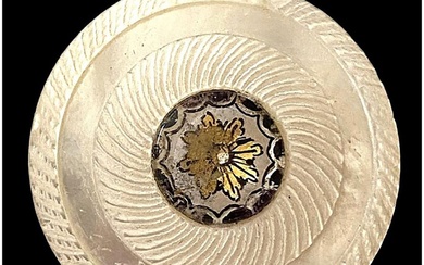 A division one pearl with glass center button