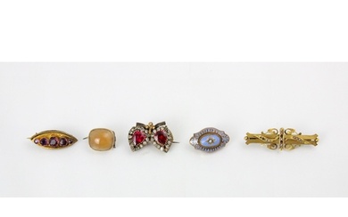 A group of five brooches, including a 9ct yellow gold Edward...