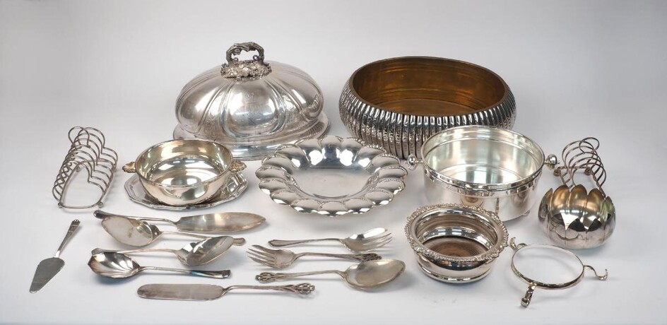 A group of silver plate including: a domed dish cover with stylised branch handle, 33.2cm long; a large fluted centrepiece dish or planter, 35cm long; two toast racks; a silver plated Asprey dish with twin shell handles; a flowerhead design dish...