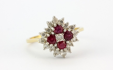 A hallmarked 18ct yellow gold cluster ring set with rubies and brilliant cut diamonds, (O).