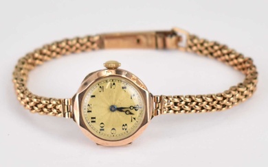 A ladies' 9ct gold wristwatch, gold coloured dial set with...