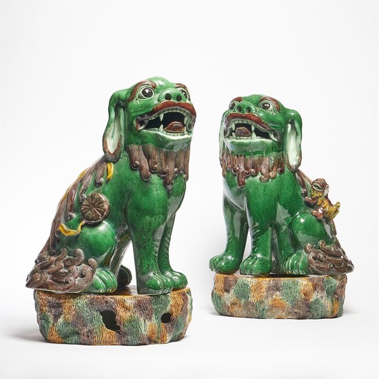 A large pair of Chinese Famille Verte Buddhistic Lions