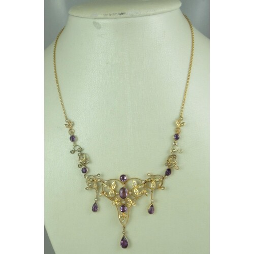 A late Victorian amethyst and seed pearl necklace set in 9ct...