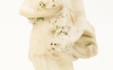 A marble statue depicting Flora. Or possibly one of the four seasons.