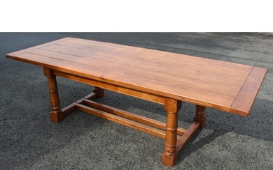 A medium oak refectory table in the 17th century style, late...
