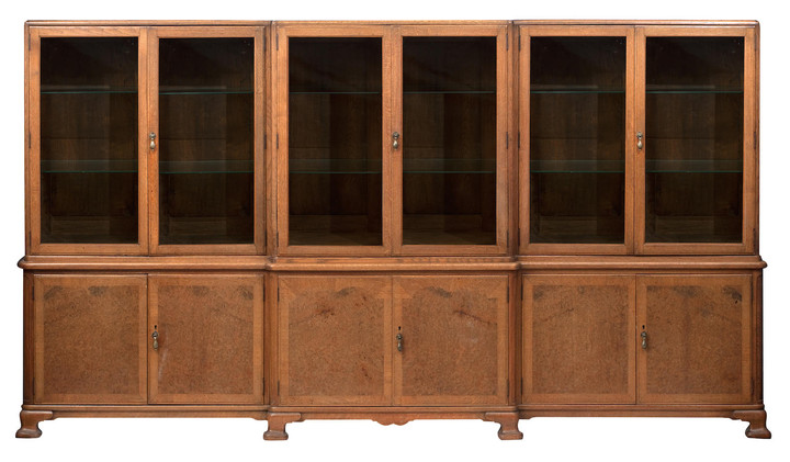 A mid 20th century oak and walnut breakfront bookcase