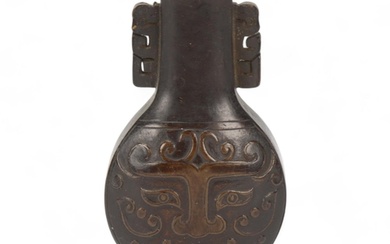 A miniature Chinese patinated bronze vase, with relief cast ...