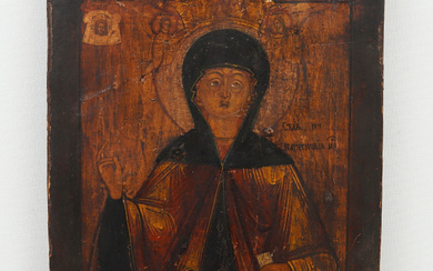 A painted wooden icon of Saint Paraskeve, Russia, 19th century., painted wood, Russia, 19th century.