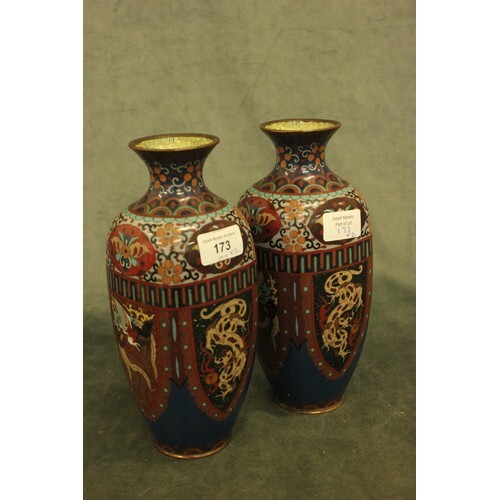 A pair of Chinese cloisonne ware vases, decorated in multi c...