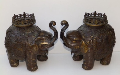 A pair of Japanese Meiji Period patinated bronze elephant...