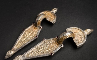 A pair of large Ostrogothic silver bow brooches, mid 5th century