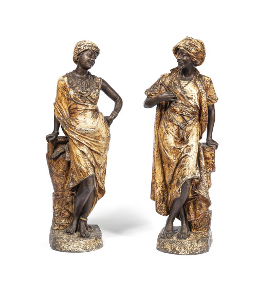 A pair of late 19th/early 20th century Austrian cold painted bronze Orientalist figures of a of a Moor and his female companion