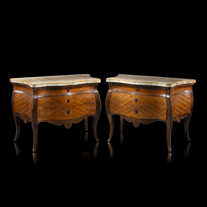A pair of rosewood and various woods veneered and inlaid commodes. Egyptian alabaster veneered top with yellow Siena marble edge....