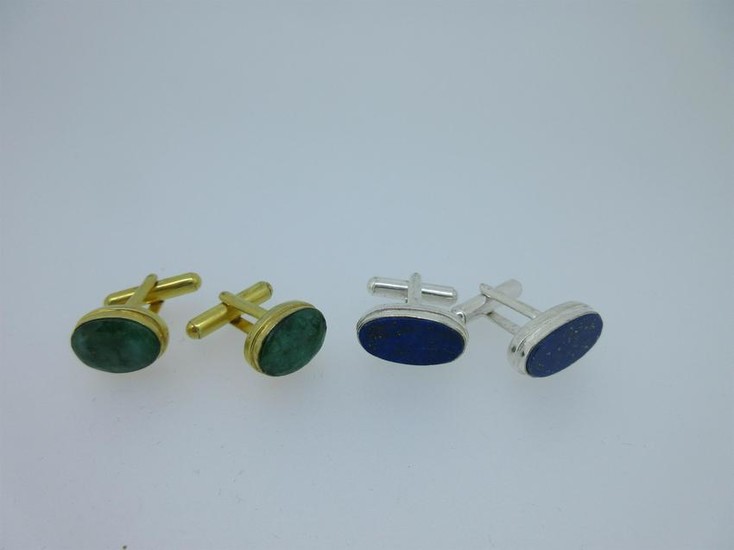 A pair of single ended emerald cufflinks and a similar