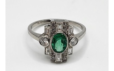 A platinum, diamond, and emerald Art Deco style ring, set wi...