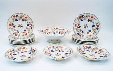 A quantity of porcelain by Flight, Barr & Barr, Worcester, first half 19th century, decorated in the Imari palette with blossoming branches with gilt detailing within gadrooned and scalloped rim, comprising: eleven side plates, marked in red to...