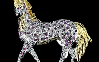 SOLD. A ruby brooch in shape of a horse set with numerous circular-cut rubies, mounted in rhodium plated and gilded sterling silver. Approx. 4 x 4.5 cm. – Bruun Rasmussen Auctioneers of Fine Art