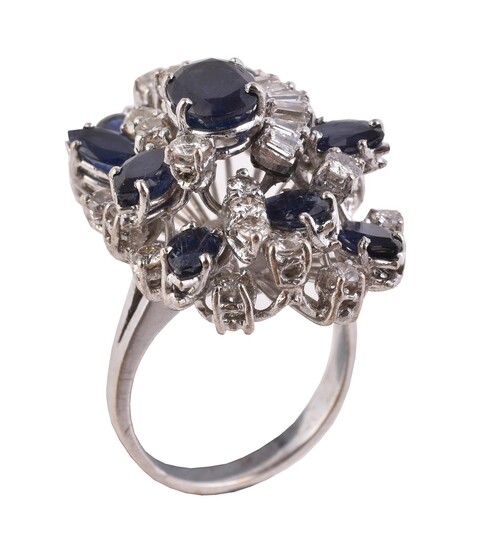 A sapphire and diamond cluster dress ring