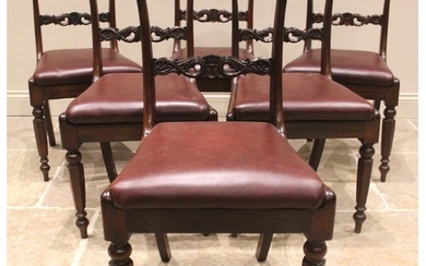 A set of seven George IV rosewood dining chairs, each with a...