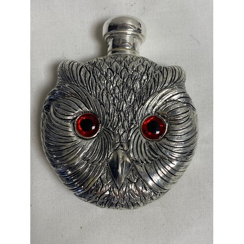 A silver plated perfume bottle, in the form of an owl's head...