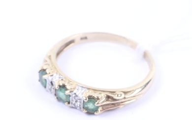 A vintage 9ct bi-colour gold, emerald and diamond cast half-hoop ring.