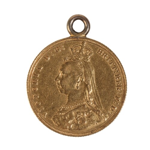 AN 1887 QUEEN VICTORIA GOLD SOVEREIGN the reverse of St. Geo...