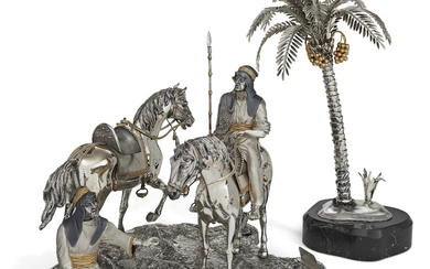 AN ITALIAN PARCEL-GILT SILVER FIGURAL GROUP AND PALM TREE MARK OF MAZZUCATO, MILAN, SECOND HALF 20TH CENTURY