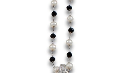 AUSTRALIAN PEARL, DIAMONDS, SPINELS AND PEARLS PENDANT, IN WHITE GOLD