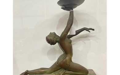 An Art Deco style figural table lamp, modelled in the form o...