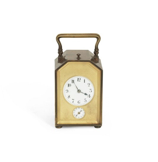 An early 20th century French brass carriage clock with alarm and repeat