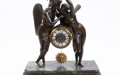 An impressive French patinated bronze mounted vert de mer marble Empire style mantel clock with Psyche crowning Cupid, 19th/20th C