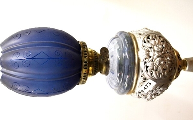 An unusual 19th century silvered cast metal oil lamp with etched blue glass shade, overall H. 64cm.