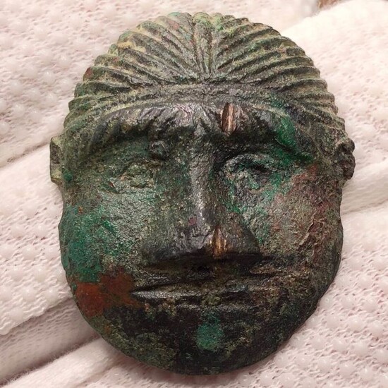 Ancient Celtic Bronze Small Mask with a facing Head of a diademed Male in very Abstractive Style