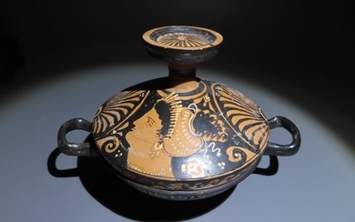 Ancient Greek Pottery Magna Graecia, Apulia. Big Lekanis with decorated lid. With two faces of a nice girl. 19 cm L.