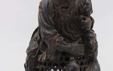 Antique Japanese Wood Carving of a Fisherman.