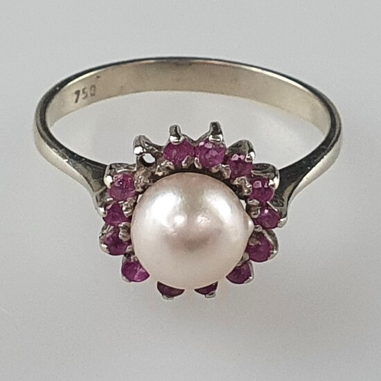 Bague perle et rubis - or blanc 750/000, poinçonnée, tête de bague sertie d'une perle...