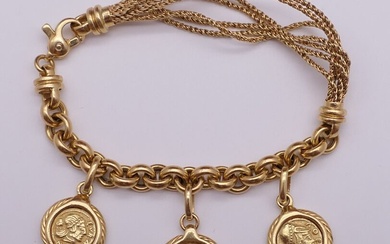 Bracelet en or jaune agrémenté de 3 pendentifs d'après des pièces de l'antiquité grecque. L....