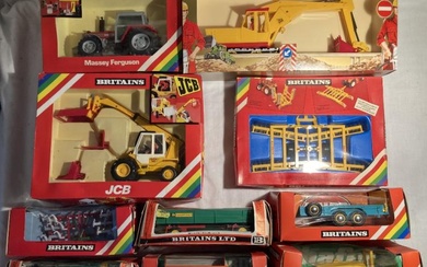 Britains: A collection of assorted Britains Farm vehicles and implements...