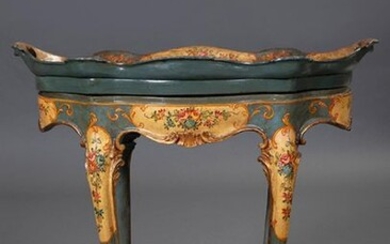 Carved and painted wooden tray table with flower decoration, possibly Italy, c.1900. With glass top. Size: 63x47x69 cm. Output: 225uros. (37.437 Ptas.)