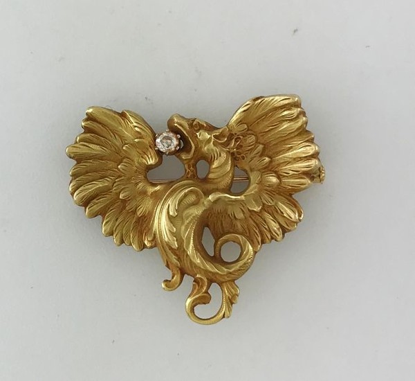 Chimera brooch in gold 750°/°°° set with a...