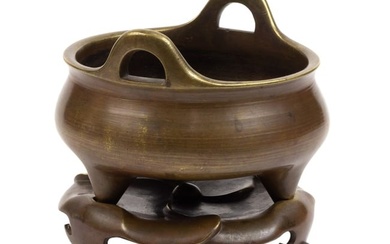 Chinese bronze tripod censer and stand
