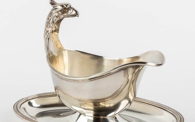 Christofle France 'Malmaison', a saucer with an eagle head. Silver-plated metal. (L:14 x W:22,5 x