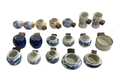 Collection of eighteen Chinese porcelain bird feeders, antiq...