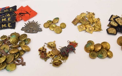 Collection of military buttons and uniform patches