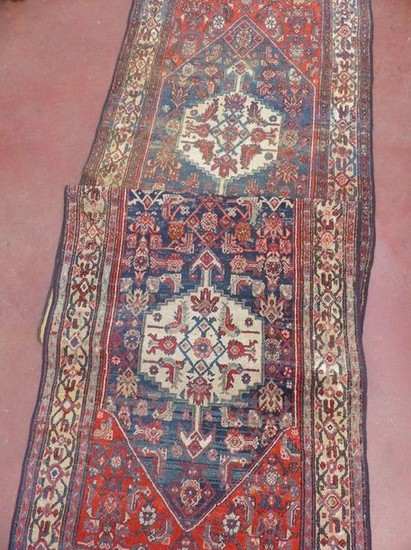 Corridor carpet with three wool medallions. Ancient Persian...