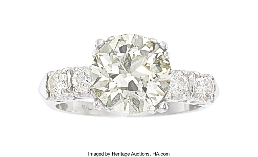 Diamond, Platinum Ring The ring features a circular brilliant-cut...