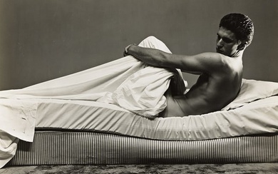 GEORGE PLATT LYNES (1907-1955) Male nude on mattress.
